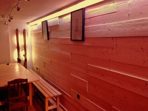 ecological accommodation in andermatt. wooden wall at a swiss hostel
